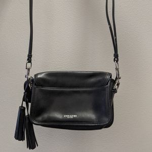 Small Black Coach Handbag with extended shoulder strap